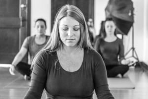 Yoga teacher training student in meditation
